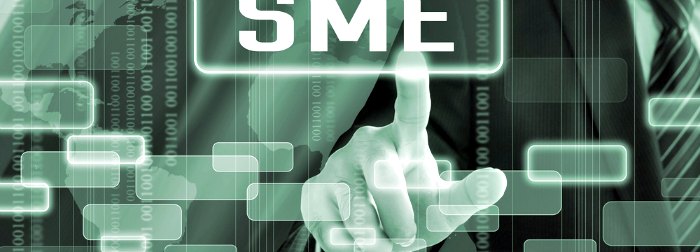 Businessman hand touching SME(or Small and Medium Enterprise) sign on virtual screen - commercial & business concept